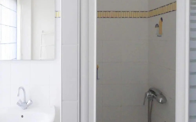 Stone House by Les Godelins Beach