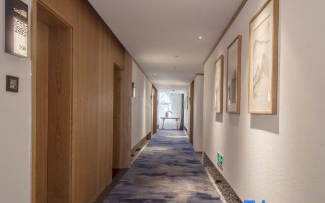 QIANNA HOTEL (Xinxiang Hualan Avenue Pangdonglai Shopping Plaza)