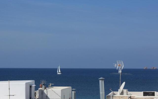 White cycladic town house with sea vew