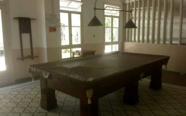 Apart de frente para a praia