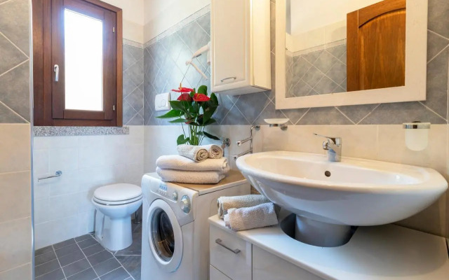 Appartamento con piscina 13