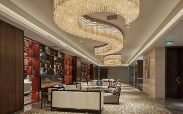 Xinzheng Xingangwanhua Hotel