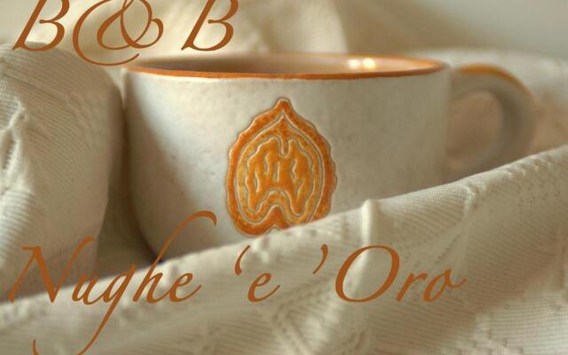 Nughe' e' Oro