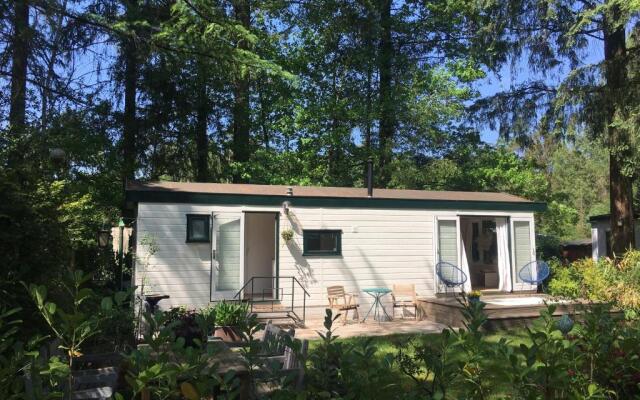 Sfeervol vakantiehuisje in bosrijke omgeving