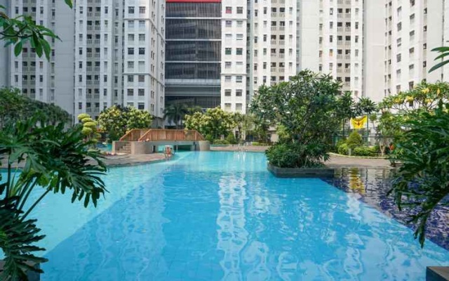 2BR with Direct Access to Pool at Green Bay Apartment By Travelio – Pool – Jakarta