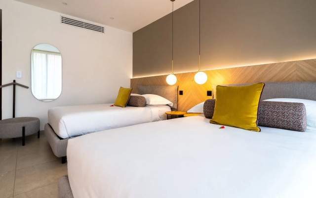 Le Petit Village Hotel & Spa