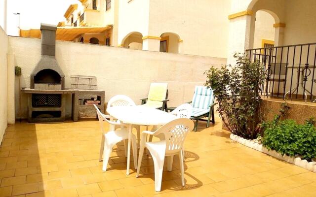 House with 3 Bedrooms in El Gran Alacant, with Wonderful Sea View, Pool Access, Enclosed Garden