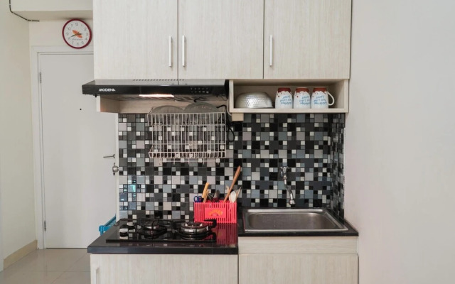 2BR Apartment with Sofa Bed at Green Pramuka City