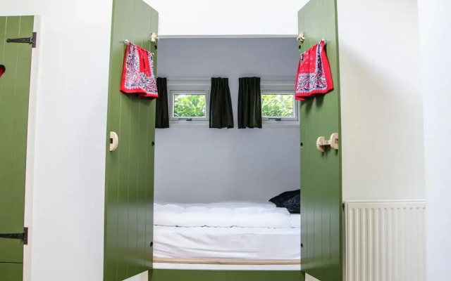 Nice house with a garden, surrounded by forest