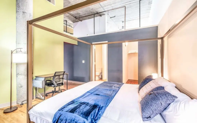 TWO Stunning Industrial Lofts by Cozysuites