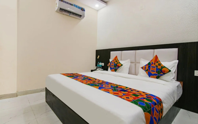 Fabhotel Palm Plaza