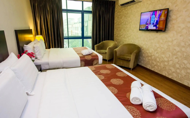 Capital O 91074 Grand World Hotel