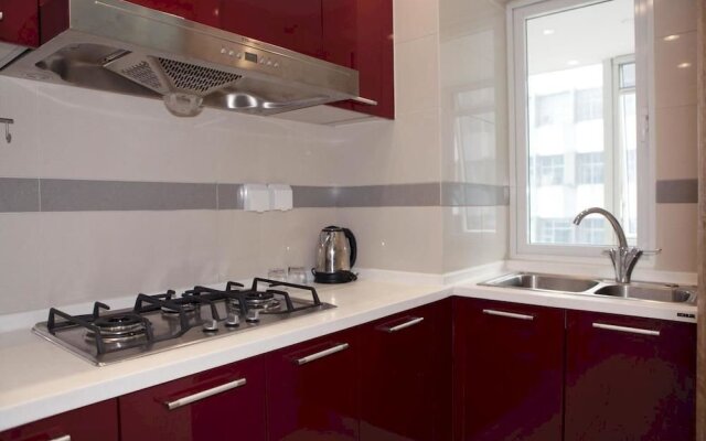 Yijia Hotel Apartment Dalian (Xinghai Daguan)