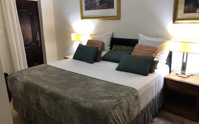 Hotel Mallika Company SL in Freetown, Sierra Leone from 58$, photos, reviews - zenhotels.com guestroom