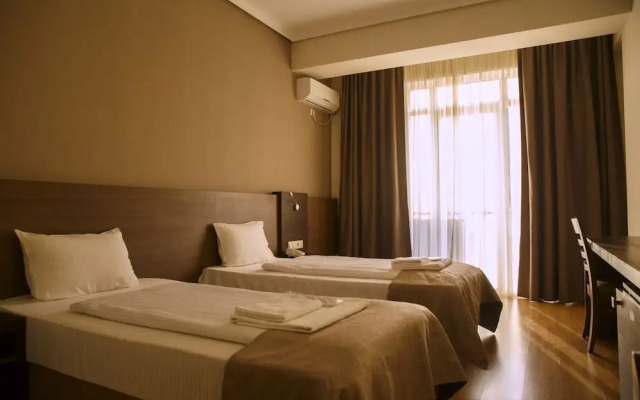 Olympus Hotel By Umbrella