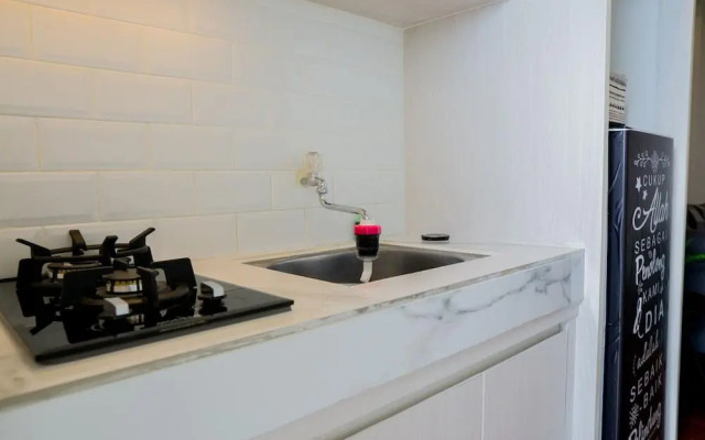 Elegant 1BR Parahyangan Residence Apartment With Mountain View