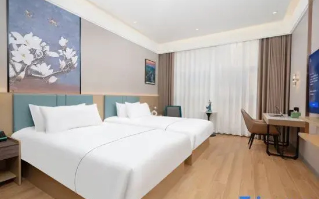 Magnotel Hotel (Xinyangdong Railway Station)