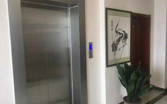 Huanle Business Hotel