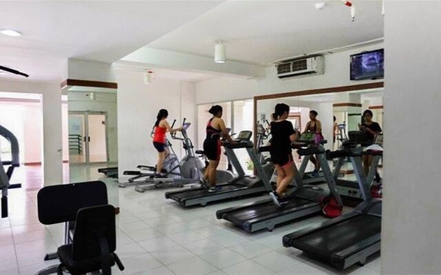 Monochrome Style 2 Bedrooms at Kalibata City Apartment By Travelio