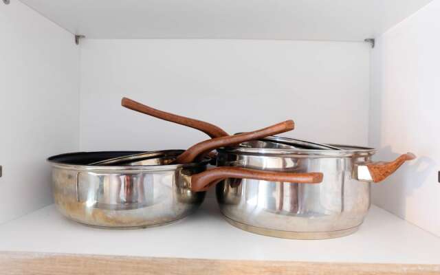 Modern and Bright 2BR Green Pramuka Apartment