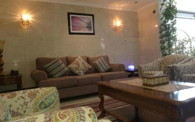 Al Ezzah Palace Hotel Suites