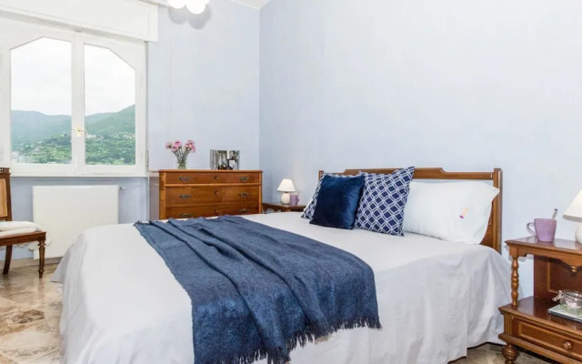 JOIVY Garden Oasis: 1BR Apt w/ Balcony & Parking