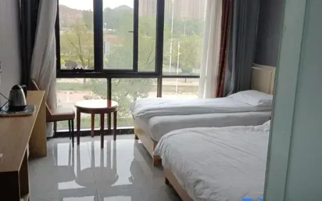 Qingya Business Hotel