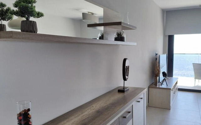 SUNSET WAVES blue sky apartment