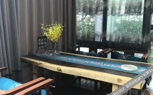 New Beacon Yunman Internation Hotel (Yingshan Tourist Center Chaxiang Small Town)