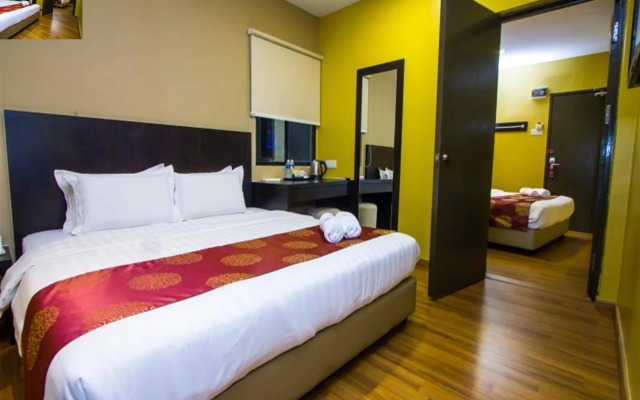 Capital O 91074 Grand World Hotel