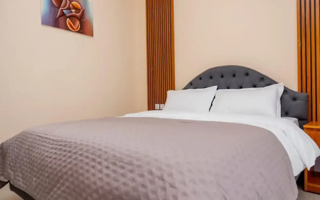 Q-Plus Apartments