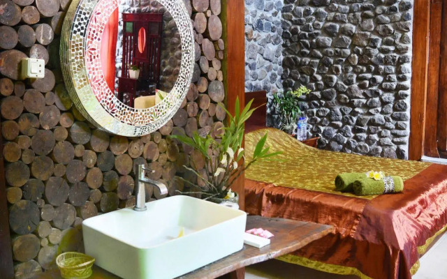 The Riverside Javanese Cottages