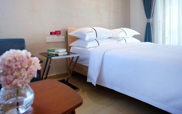 Green Collection Care Hotel (24 Hours Free Transfer from Meilan Airport/Railway Station)