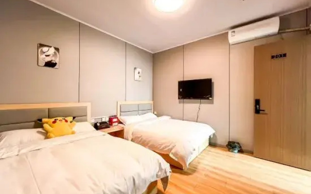 Luoyang Qingqing Yuanshe Homestay (Lijingmen Cross Street Store)