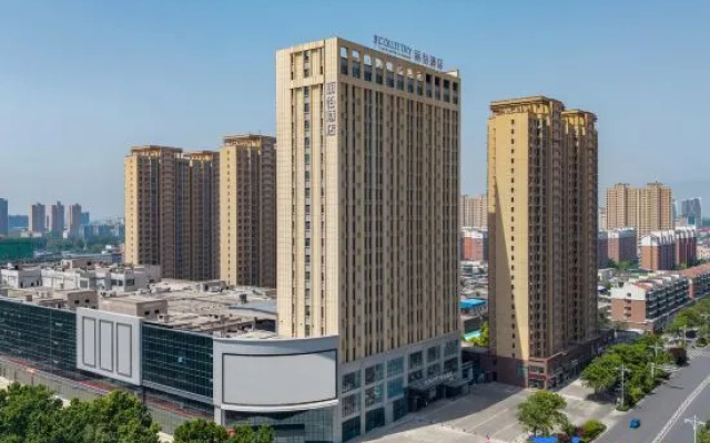 Jinjiang Country Inn & Suites by Radisson Hotel (Xinxiang Huixian Qunxin Tiandi Shopping Center) – Outside – Xinxiang