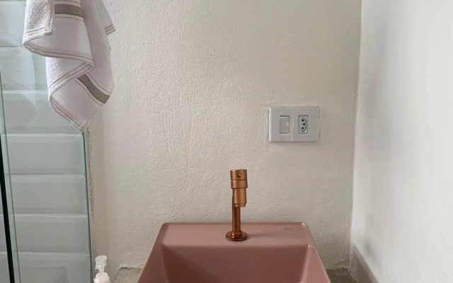 Apartamento com cachoeira no quintal