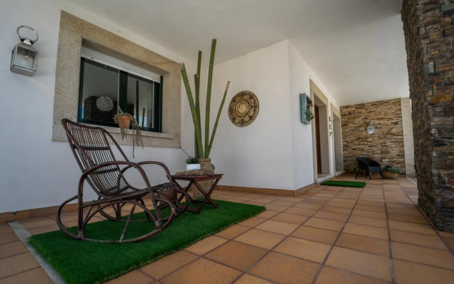 Villa con piscina a pie de playa