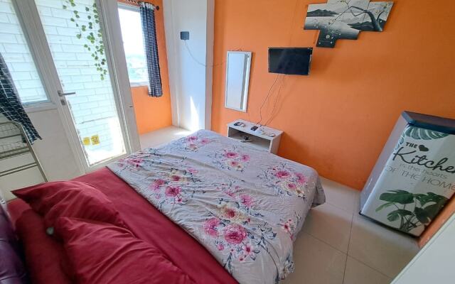 OYO Life 93139 Apartemen Grand Sentraland By Evi