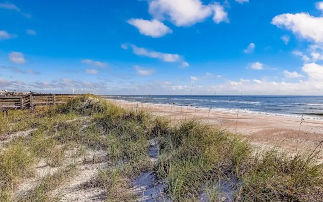 Newly Remodeled Oceanfront Condo with Salt Water Pool and Private Walkway to Beach by RedAwning