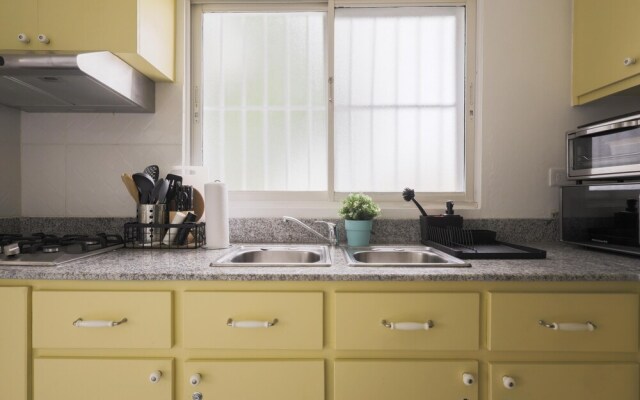 Unwind and Recharge in This Homey Central Retreat