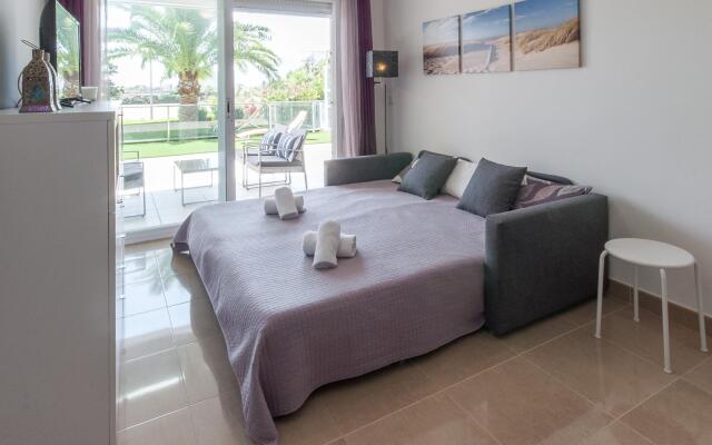 AIRE - Apartment with shared pool in Oliva Nova. Free WiFi