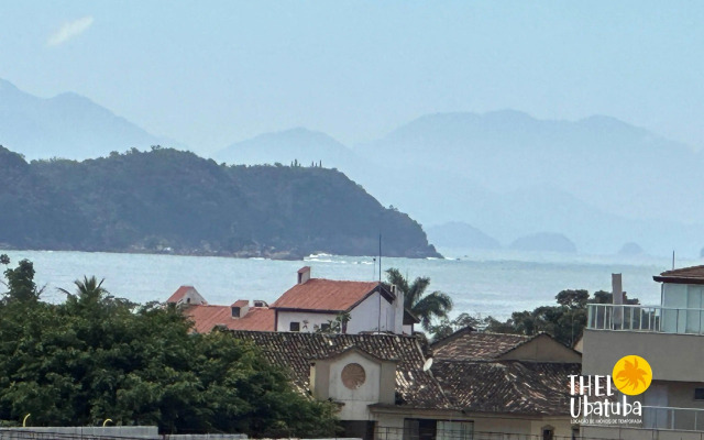 Apto completo e confortável com roupa de cama nas Toninhas  Condomínio Lumière