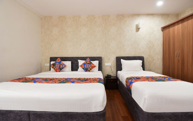 Fabhotel Dhanvitha Suites