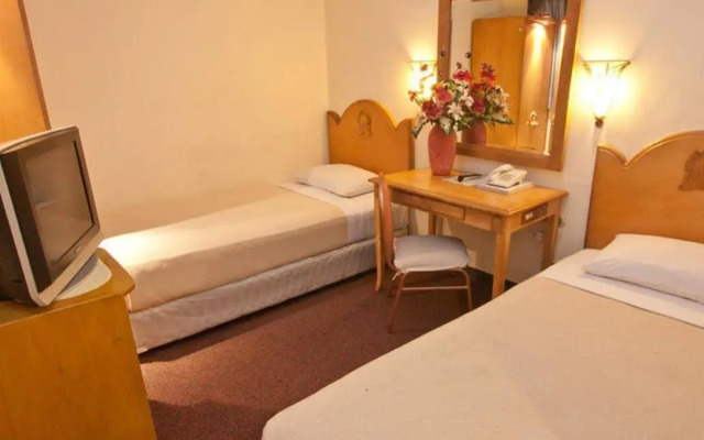Palladium Suites Hotel