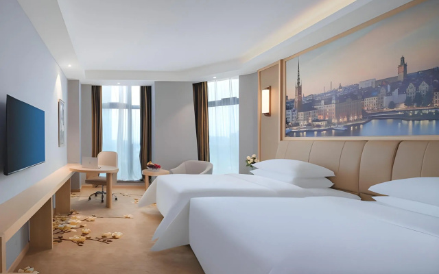 Vienna Hotel (Shaoxing  China Textile City Mingzhu Square Metro Station Branch) – Guest Rooms – Shaoxing