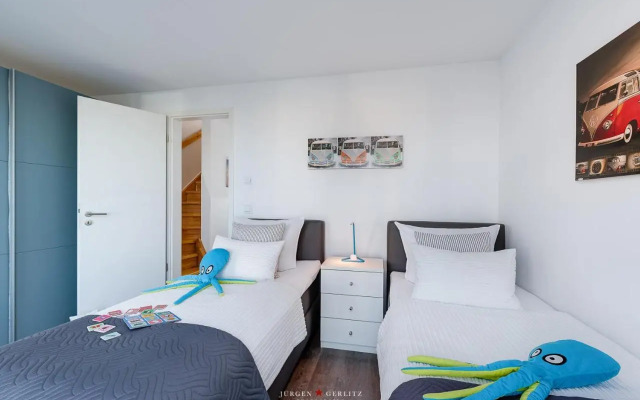Ostseewind: Wasserblick, finnische Sauna, Whirlwanne, Kamin, 2 Parkplaetze