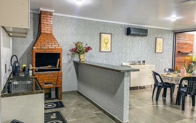 Casa Central piscina e AC para 8 hospede