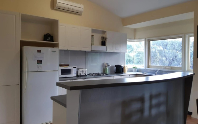 Elevated holiday house in bush setting overlooking wetlands