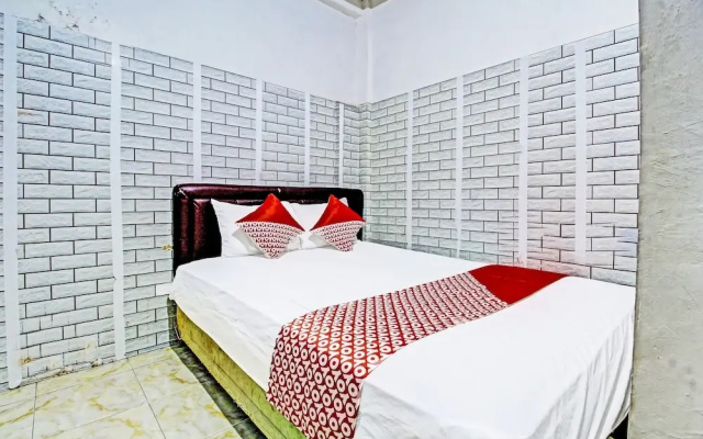 Coupis Guesthouse by OYO Rooms
