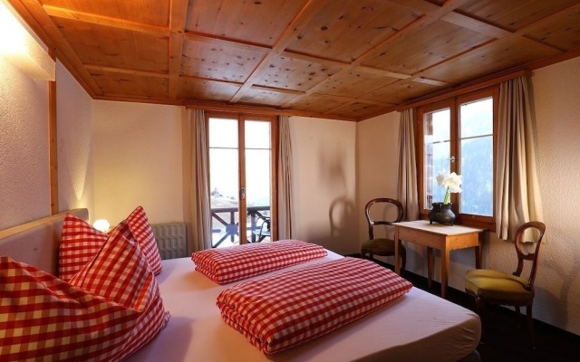 The Alpina Lodge – Guest Rooms – Churwalden